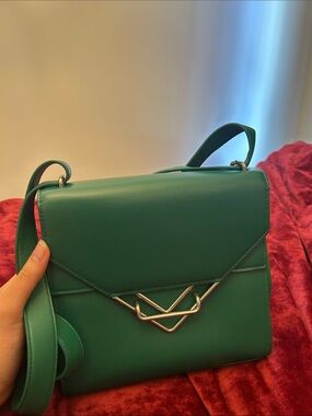 Sculpted Emerald Leather Shoulder Bag with Sculptural Metal Accent